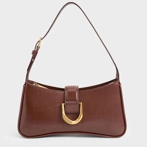 Charles & Keith Gabine Curved Shoulder Bag in Chocolate